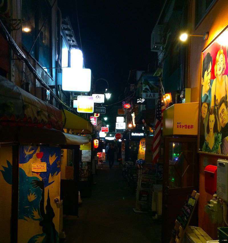 Photograph of A typical Golden Gai alley with numerous tiny bars