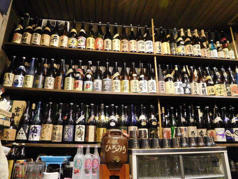 Photograph of Sake bottles - one of everything!