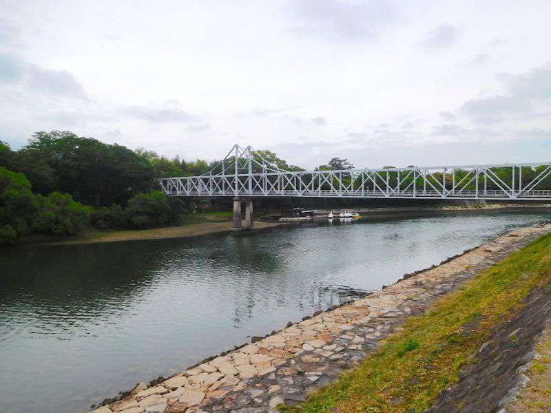 Photograph of The Yuejian Bridge in Okayama leading from Okayama Castle over the Asahi river to Okayama Park and Kōraku-en Japanese Gardens